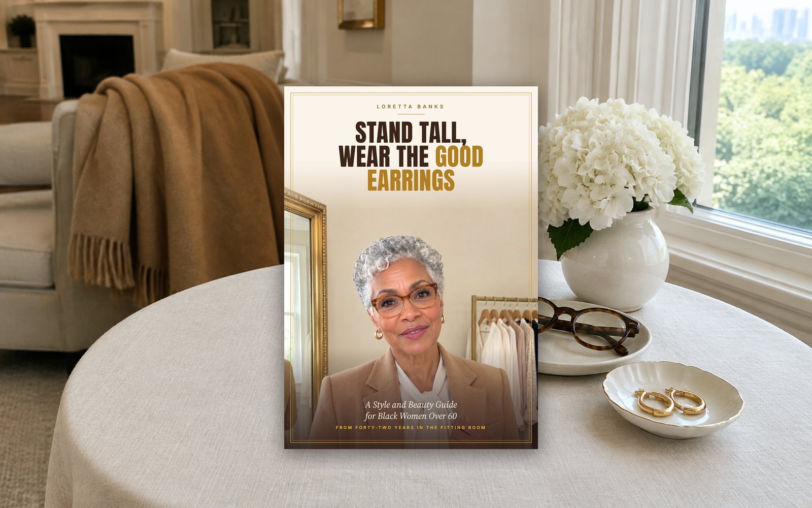 The book Stand Tall, Wear the Good Earrings lying on a table at home